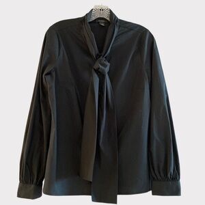 Halogen button front blouse long sleeve button cuffs. Cute ties at neck. Small
C
